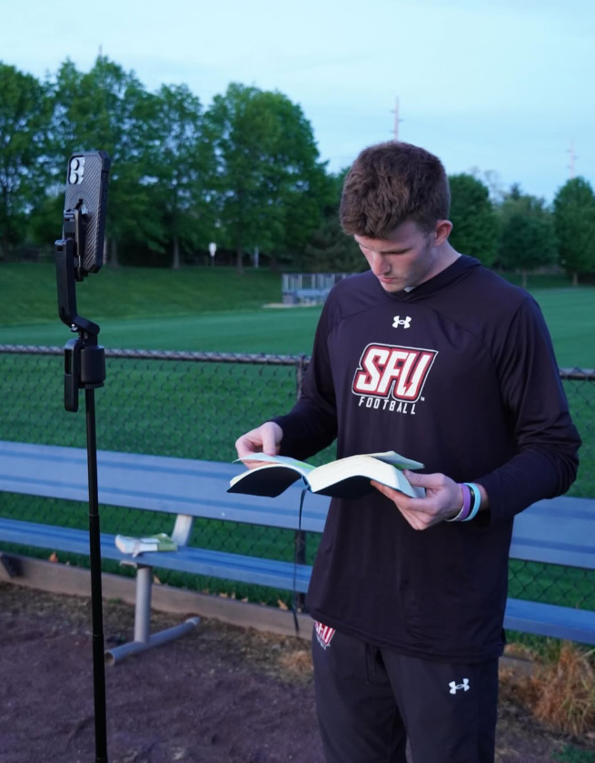 Mike Schumacher Jr. studying scripture before training